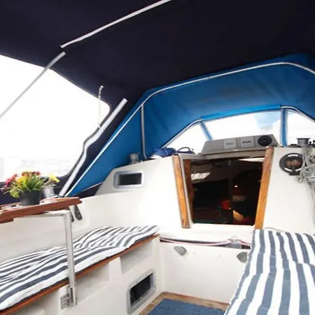 Sailing Boat In Center Of
